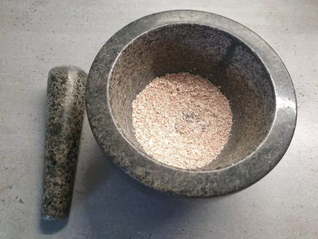 Mortar and pestle crushed eggshells